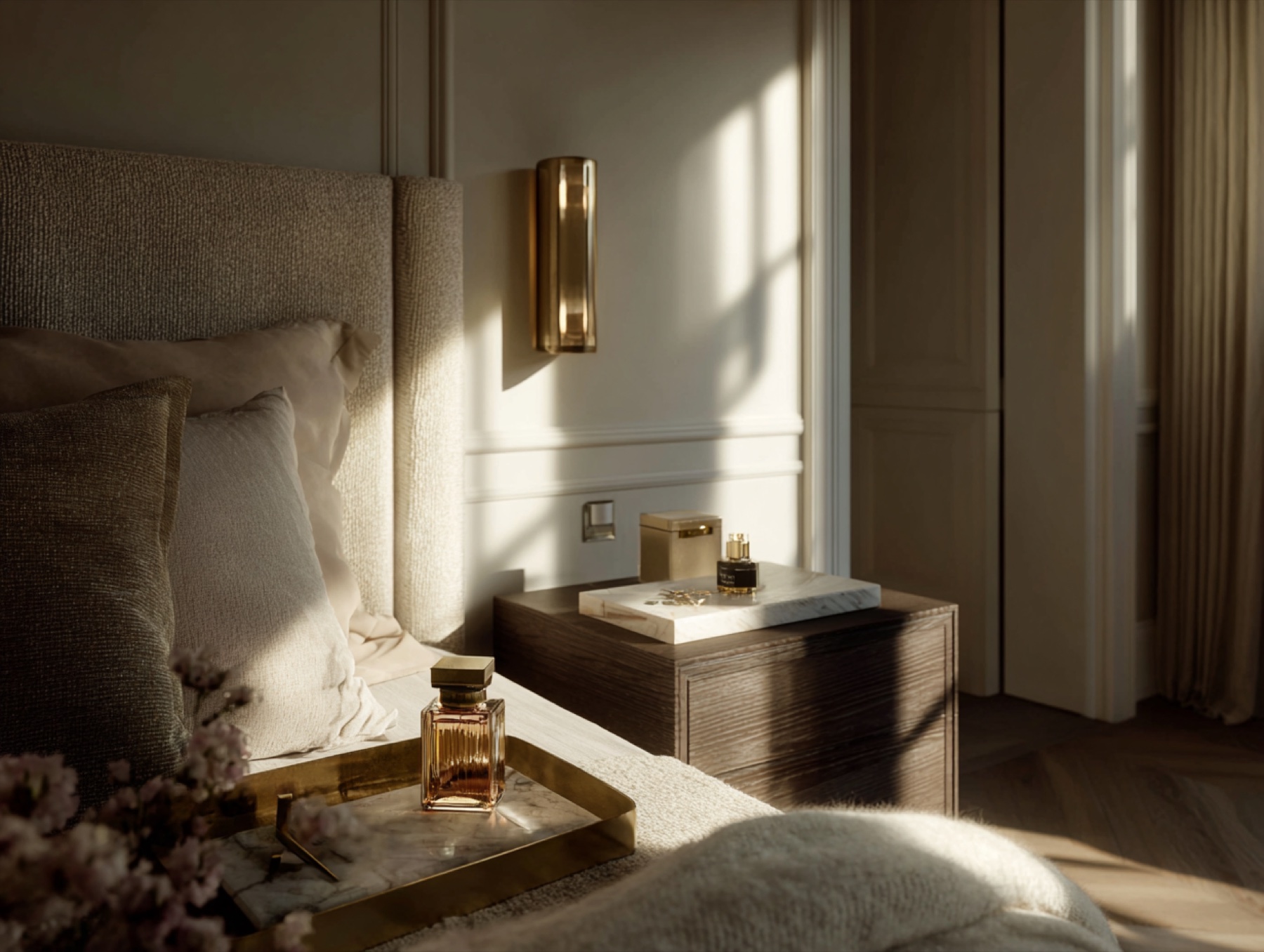 Amber fragrance bottles in a warm bedroom with cinematic afternoon shadows.