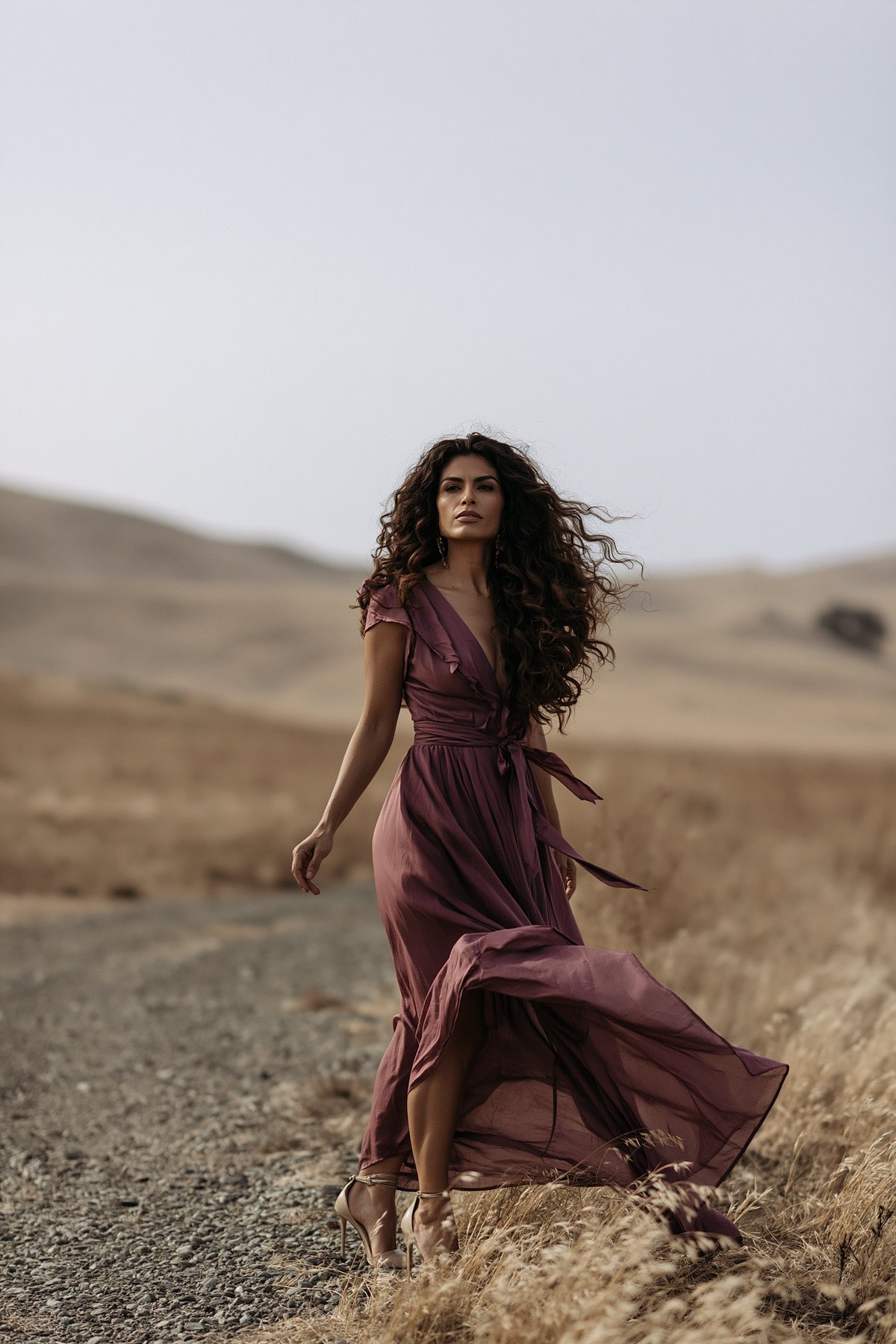 Realistic AI fashion character walking through a cinematic desert landscape.